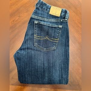 Lucky Brand Sweet Jean Boot. Size 6/28 Long. Some wear on the rear cuffs.